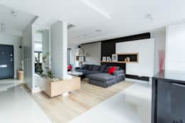 Sala de plano aberto: sala de estar moderna por GK Architects Ltd 