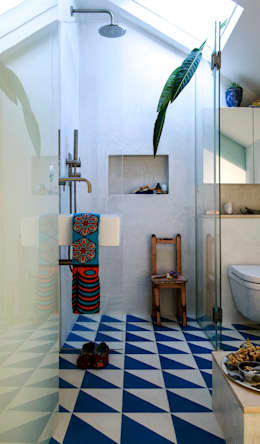 Peponi House: Banheiros tropicais por STUDIO [D] TALE 